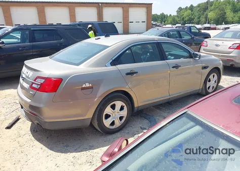 2013 Ford Police Interceptor z USA, uszkodzony, nr VIN 1FAHP2M87DG201729